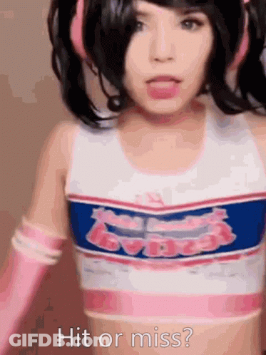 A Girl In A Cheerleader Outfit Is Asking If She Is Hit Or Miss GIF