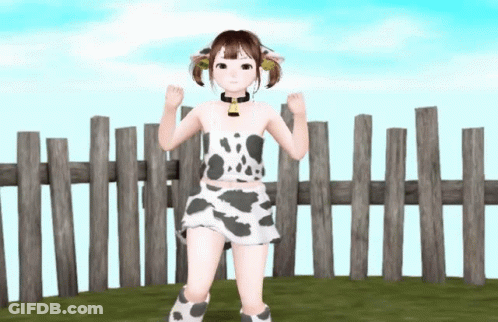A Girl In A Cow Print Outfit Stands In Front Of A Fence GIF