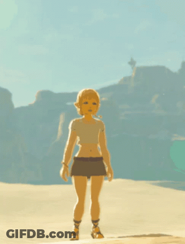A Girl In A Crop Top And Shorts Is Standing On A Sandy Beach GIF