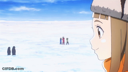 A Girl In A Fur Hat Is Looking At A Group Of People Standing In The Snow GIF