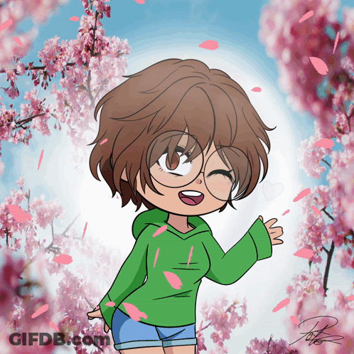 A Girl In A Green Hoodie Is Surrounded By Cherry Blossom Trees GIF