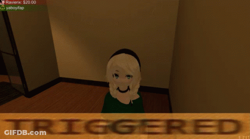 A Girl In A Green Shirt Is Standing In A Room With The Word Triggered Behind Her GIF