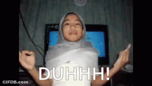 A Girl In A Hijab Is Wrapped In A Piece Of Paper And Says Duhhhh GIF