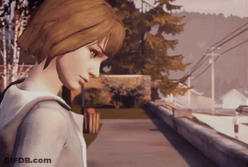 A Girl In A Hoodie Stands On A Sidewalk GIF