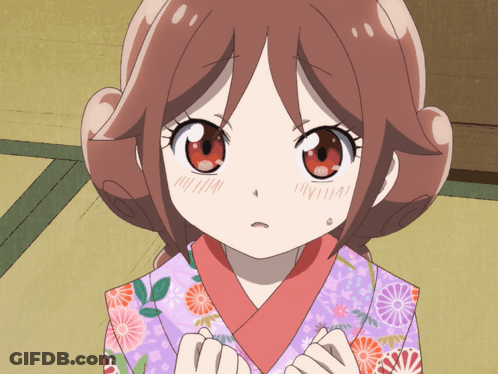 A Girl In A Kimono With Flowers On It Is Looking At The Camera GIF