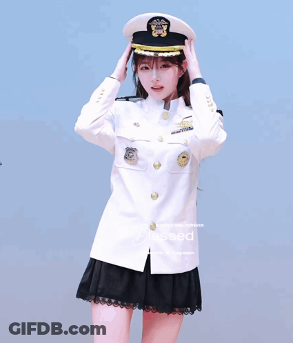A Girl In A Military Uniform Salutes While Another Girl Walks By GIF