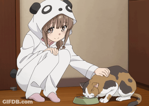 A Girl In A Panda Costume Is Petting A Cat That Is Eating Out Of A Bowl GIF