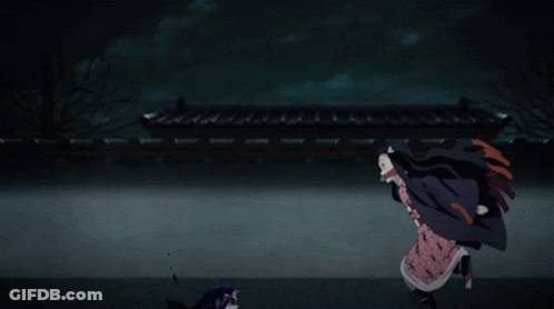 A Girl In A Pink Dress Is Jumping In The Air In A Dark Room GIF