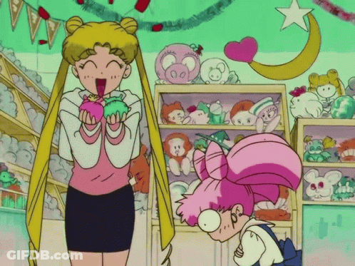 A Girl In A Pink Dress Is Standing Next To A Girl In A Pink Dress GIF
