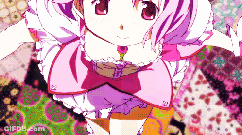 A Girl In A Pink Dress With A Necklace That Says A On It GIF