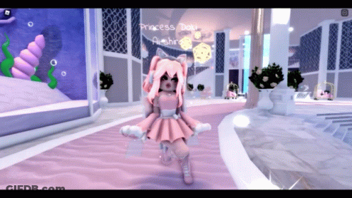 A Girl In A Pink Dress With The Name Princess Doki GIF