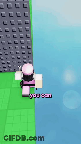 A Girl In A Pink Hat Is Standing On A Green Block With The Words " You Can " Above Her GIF