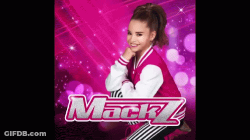 A Girl In A Pink Jacket And Striped Pants Is Standing In Front Of A Pink Background With The Word Mackz . GIF