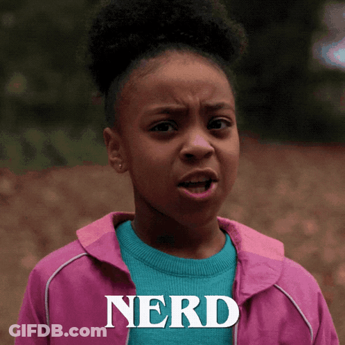 A Girl In A Pink Jacket With The Word Nerd Written On It GIF