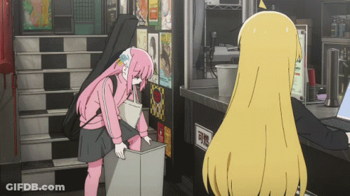 A Girl In A Pink Outfit Is Standing Next To A Girl In A Yellow Outfit GIF