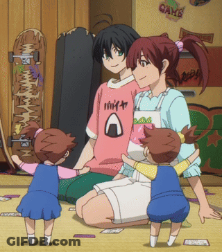 A Girl In A Pink Shirt With An Onigiri Logo On It GIF