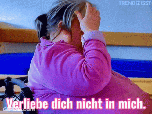 Girl In Pink Shirt With Verliebe Dich Nicht In Mich GIF