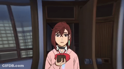 A Girl In A Pink Sweater Is Holding A Wallet In Her Hand GIF