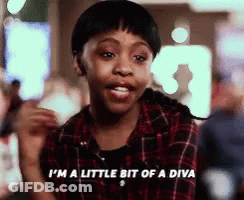 A Girl In A Plaid Shirt Is Saying " I 'M A Little Bit Of A Diva " GIF