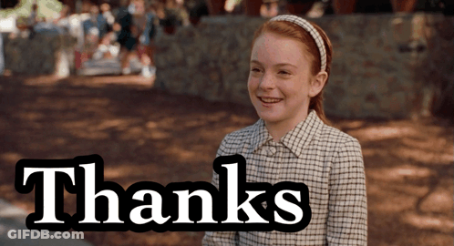 A Girl In A Plaid Shirt Is Smiling In Front Of The Word Thanks GIF