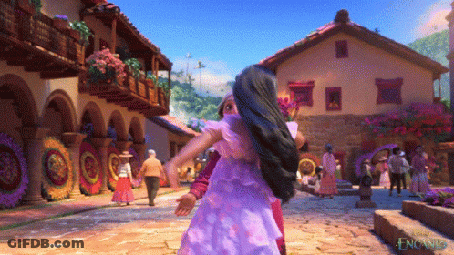 A Girl In A Purple Dress Is Being Held By A Man In A Purple Dress GIF