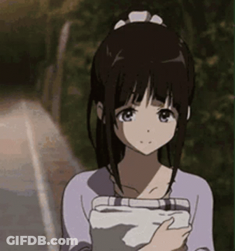 A Girl In A Purple Shirt Is Holding A Tablet In Her Hand . GIF