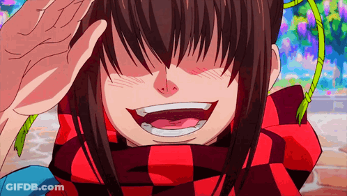 A Girl In A Red And Black Scarf Is Smiling GIF