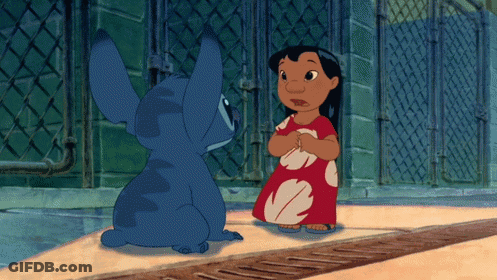 A Girl In A Red Dress Is Standing Next To A Blue Cartoon Character GIF