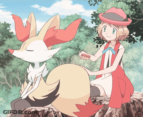Girl In Red Hat Brushing Fox Fur GIF