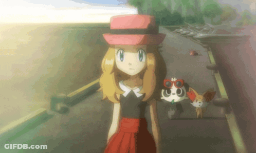 Girl In Red Hat Standing Next To Cartoon Character GIF