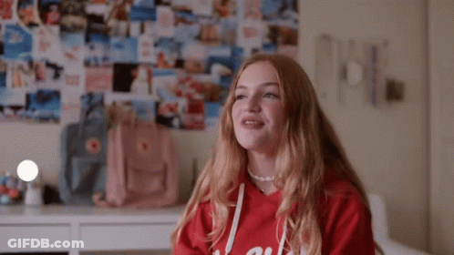 A Girl In A Red Hoodie With The Name Liv On The Bottom GIF