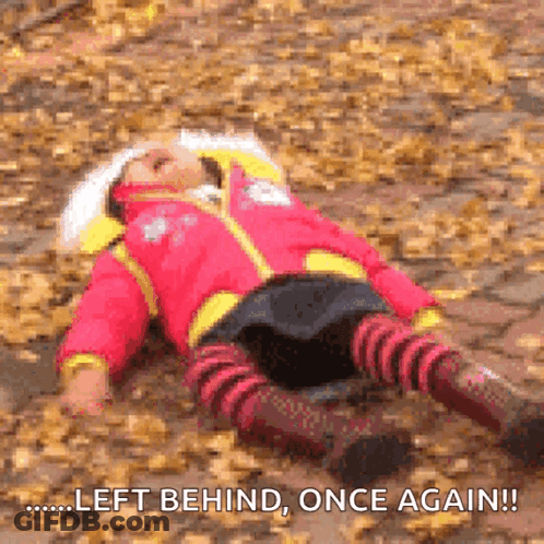 A Girl In A Red Jacket Is Laying On The Ground With The Words Left Behind Once Again GIF