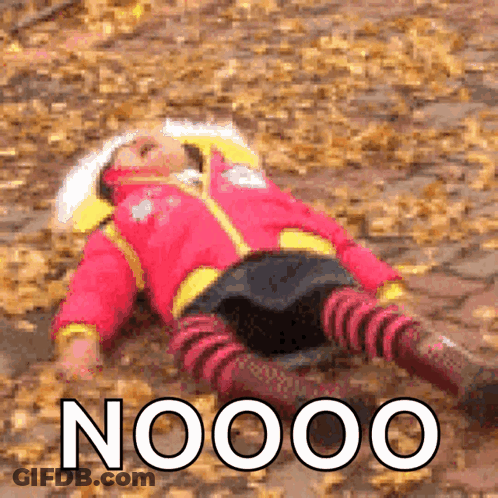 A Girl In A Red Jacket Is Laying On The Ground With The Words Noooo Written On The Bottom GIF