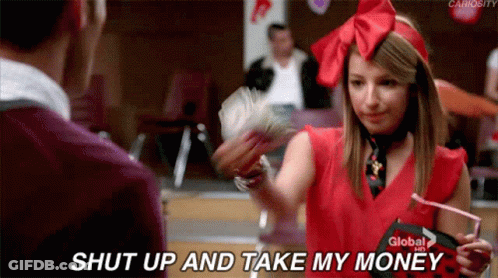 A Girl In A Red Shirt Is Holding A Bunch Of Money And Says Shut Up And Take My Money GIF