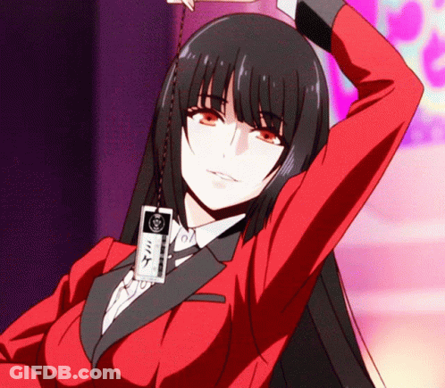 A Girl In A Red Suit Has A Card Around Her Neck That Says ' Mike ' On It GIF