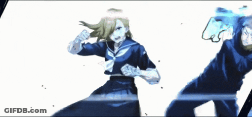 A Girl In A Sailor Uniform Is Holding A Blue Object In Her Hands GIF