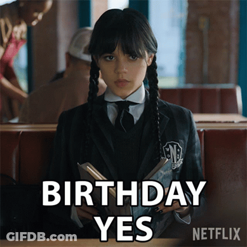 A Girl In A School Uniform Is Reading A Book And Says " Birthday Yes " In White Letters GIF