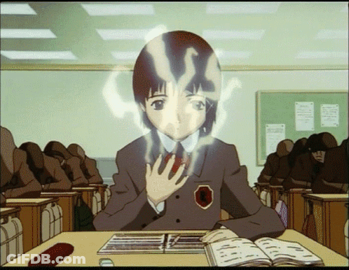 A Girl In A School Uniform Is Sitting At A Desk With A Book In Front Of Her GIF