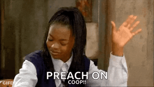 A Girl In A School Uniform Is Sitting At A Table With Her Hands In The Air And Says Preach On Coop . GIF