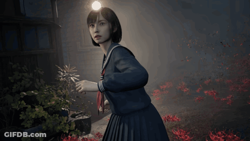 A Girl In A School Uniform Is Standing In A Dark Area With Red Flowers GIF