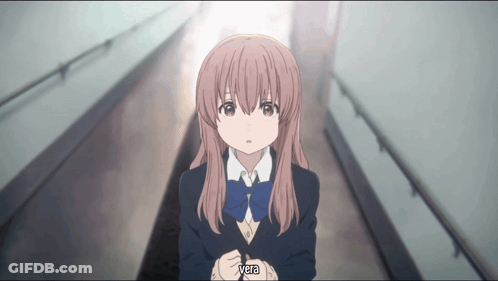 A Girl In A School Uniform Is Standing In A Hallway And Says Vera GIF