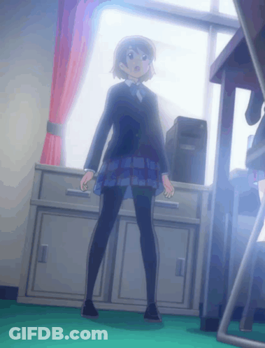 A Girl In A School Uniform Is Standing In Front Of A Desk GIF