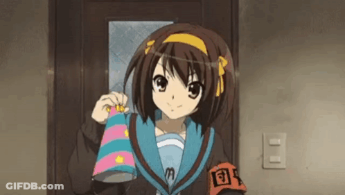 A Girl In A School Uniform Is Standing In Front Of A Door Holding A Blanket . GIF