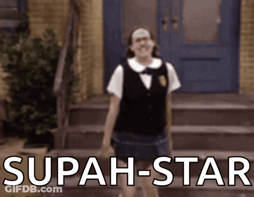 A Girl In A School Uniform Is Standing In Front Of Stairs With The Words ' Superstar ' In White Letters GIF
