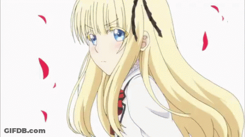 A Girl In A School Uniform Is Surrounded By Pink Petals Flying In The Air . GIF