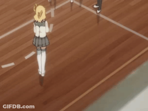 A Girl In A School Uniform Is Walking On A Wood Floor GIF