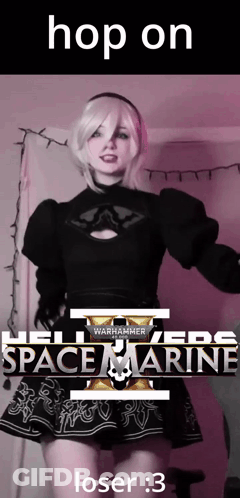 A Girl In A Space Marine Costume Is Standing In Front Of A Sign That Says " Hop On " GIF