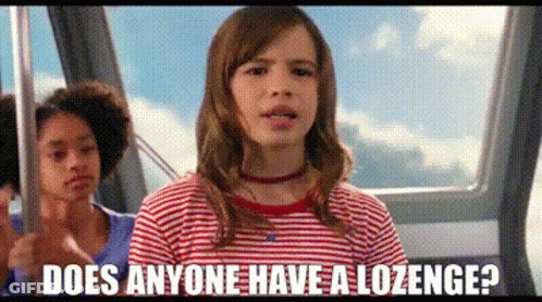 A Girl In A Striped Shirt Is Riding A Cable Car And Asking Does Anyone Have A Lozenge ? GIF