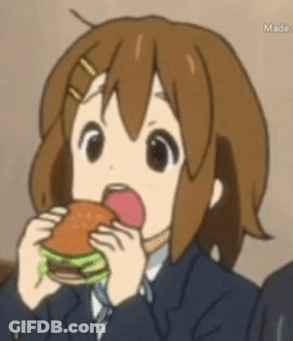 A Girl In A Suit Is Eating A Hamburger GIF