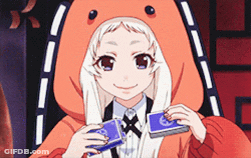 A Girl In A Teddy Bear Costume Is Holding Two Playing Cards GIF